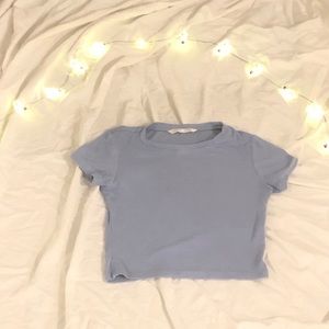 This baby tee ( crop top) is from Ukids  it’s in the Color light blue!